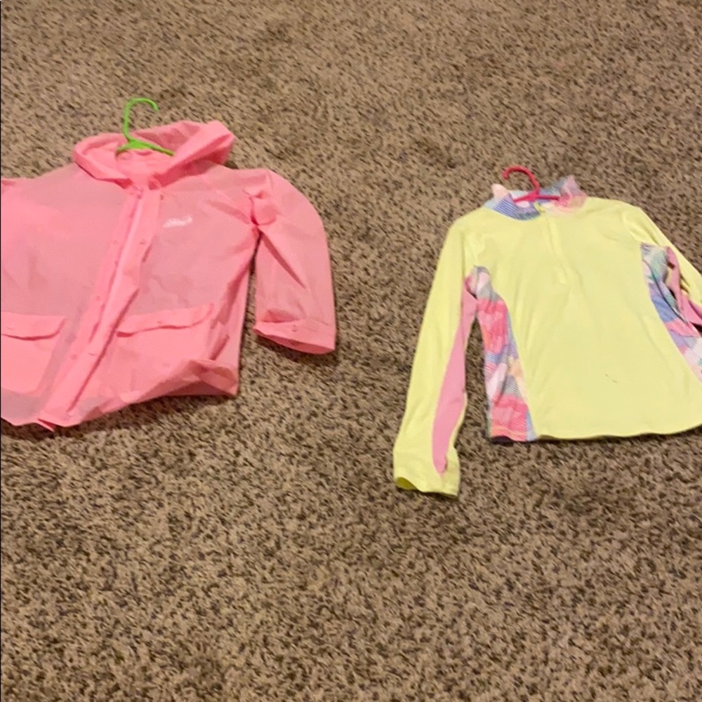 Pink rain jacket and neon yellow long sleeve shirt
